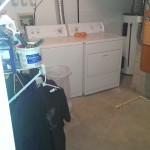 basement- washer and dryer in furnace room area